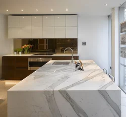 Wooden kitchen design with marble countertops