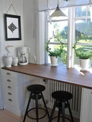 Kitchen window sill design with flowers