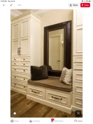 Hallway design with soft seat and mirrors