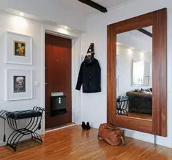 Cabinet Design In The Hallway Opposite The Front Door