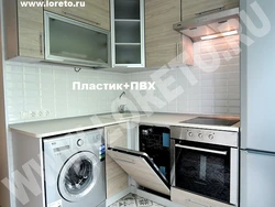 Kitchen with design gas stove, refrigerator and microwave