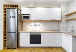 Kitchen with design gas stove, refrigerator and microwave