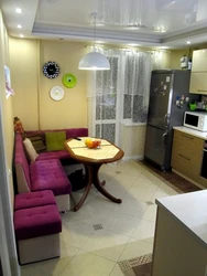 Kitchen design with sofa and TV and balcony