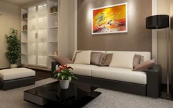 Living room design in an apartment with a sofa and wardrobe