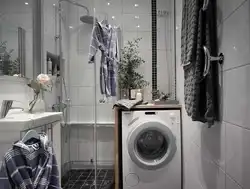 Bathroom design with shower and washing machine and dryer
