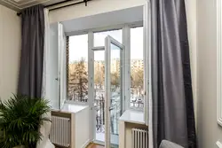 Window with balcony in apartment photo