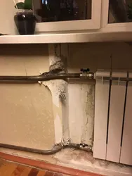 Kvartirada devor fotosuratida isitish