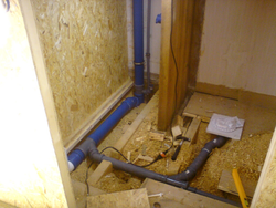 Pipes to the floor in the apartment photo