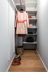 Storage rooms in the toilet photo in the apartment