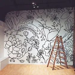 Drawings on the wall in the apartment with your photos