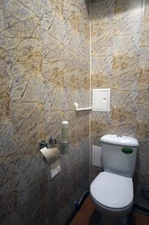 Decorative plaster for a toilet in an apartment photo