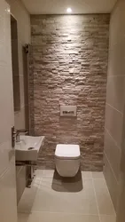 Decorative plaster for a toilet in an apartment photo