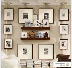 Is it possible to hang photographs on the walls in the apartment?
