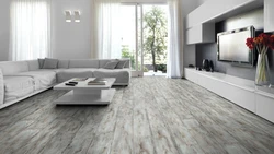 Laminate flooring of the same color throughout the apartment photo