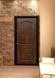 Stone decoration of the entrance door in the apartment photo