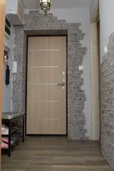 Stone decoration of the entrance door in the apartment photo