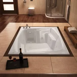 Bathtub in the floor in the apartment photo