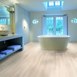 Bathtub in the floor in the apartment photo