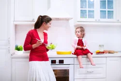 Photo of my mom at home in the kitchen