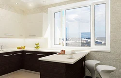 Photo of a plastic window for the kitchen with installation