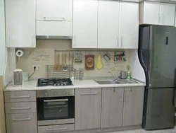 Kitchen refrigerator stove sink photo