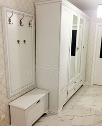 White hallway with mirror photo