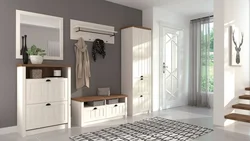 White hallway with mirror photo