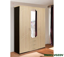 Three-leaf wardrobe in the bedroom photo