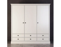Three-leaf wardrobe in the bedroom photo