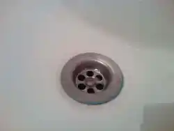Photo of hole in bathroom
