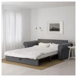 Photo sleeping sofa bed