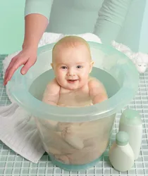 Photo Of A Newborn In The Bath