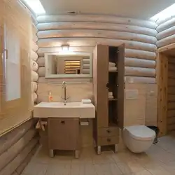 Bathroom made of logs photo