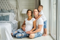 Photo of family in bedroom