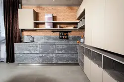 Photo of loft concrete kitchen