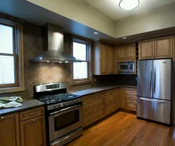 Kitchen design with wide refrigerator