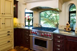 Kitchen design with stove on edge