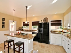 Kitchen design with stove in the middle of the kitchen