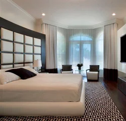 Bedroom design with a window in the center