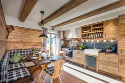 Living room kitchen design in chalet style