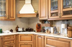 Kitchen design with hood in the corner