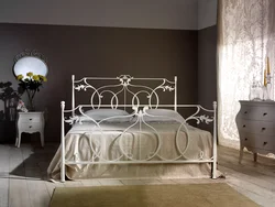 Bedroom design with white metal bed