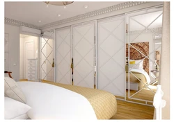 Bedroom wardrobe design in a modern style without mirrors