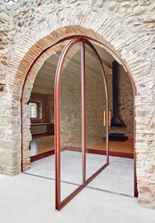 Doors for arches in an apartment photo