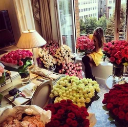 Photo of flowers on the floor in the apartment