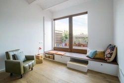 Window without a window sill in the interior of an apartment photo