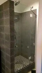 Do-it-yourself shower in an apartment made of tiles photo