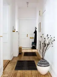 White tiles in the interior of the apartment