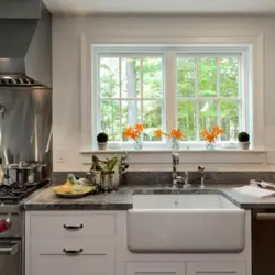 Kitchen in your house with a window and sink photo
