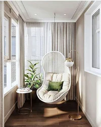 Loggia design with hanging chair